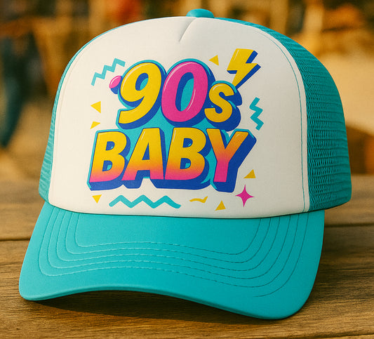 Trucker hat with '90s Baby' text on a wooden surface