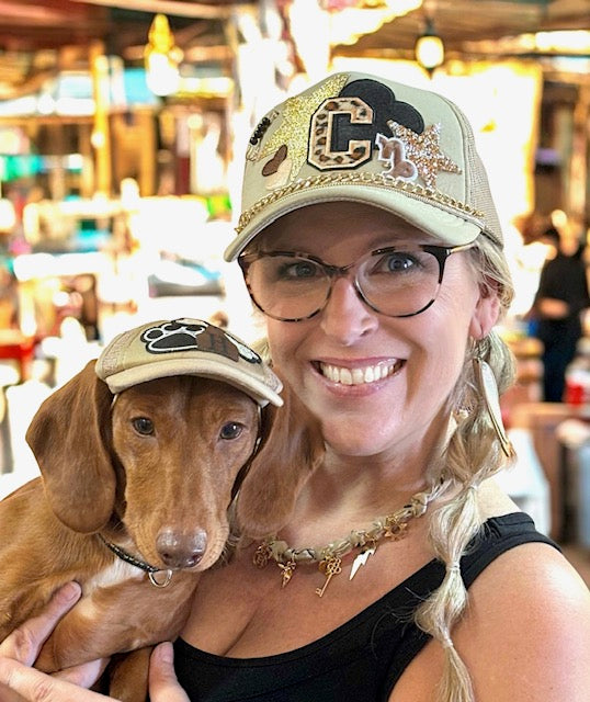 Trucker hats for dogs and people with custom patches.